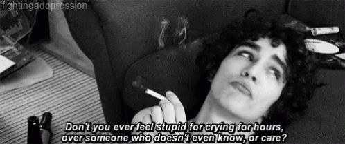 Black and White Man Smoking Cigarette With Quote