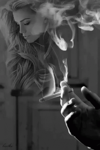 Black And White Man Smoking Cigarette Woman Behind GIF