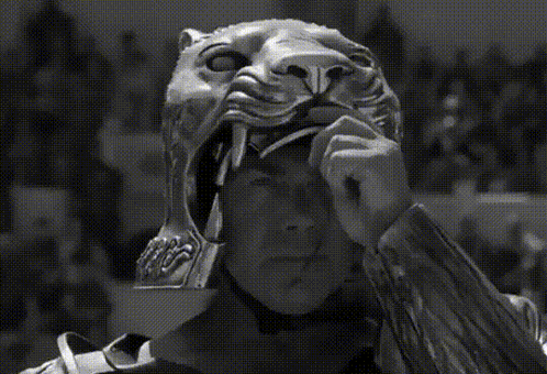 Black And White Man Wearing Lion Helmet GIF