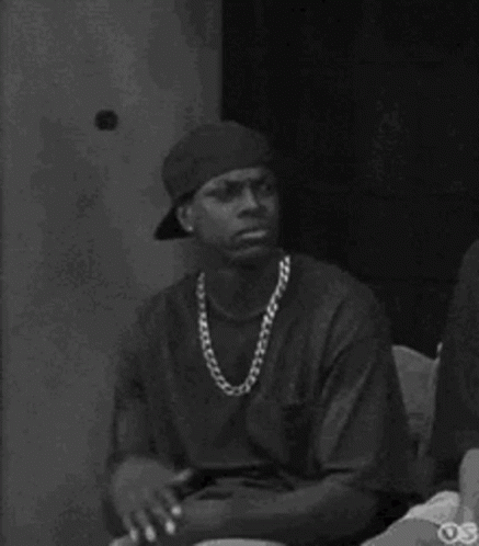 Black and White Man with Baseball Cap and Chain