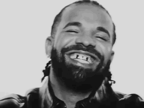 Black and White Man With Beard and Dreadlocks Smiling