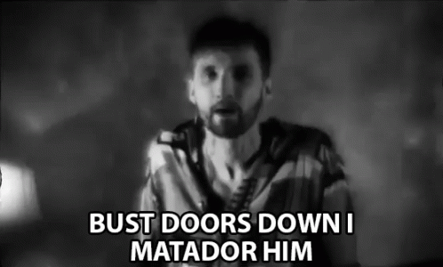 Black and White Man With Beard Saying Bust Doors Down I Matador Him