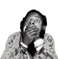 Black and White Man With Headphones Covering Mouth