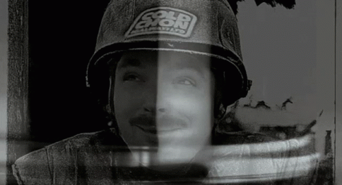 Black And White Man With Helmet Saying Cold Exion GIF