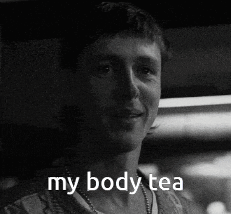 Black and White Man With My Body Tea on Face