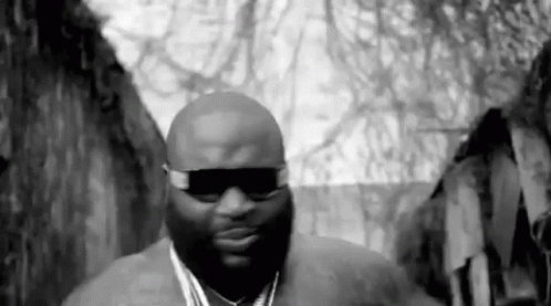 Black And White Man With Sunglasses And Medallion GIF
