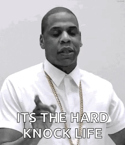 Black And White Man With White Shirt And Gold Chains GIF
