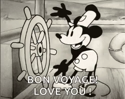 Black and White Mickey Mouse Holding Steering Wheel