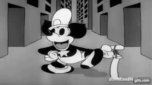Black and White Mickey Mouse in Top Hat Holding Paper