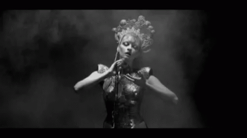 Black And White Naked Woman Dancing In Dark Room GIF
