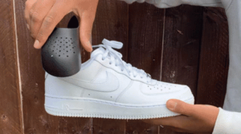 Black And White Nike Shoe With Blue Swoosh GIF