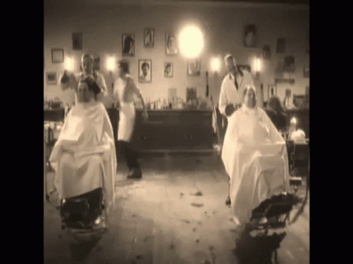 Black and White People Getting Haircuts