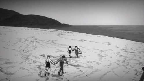 Black and White People Holding Hands on Beach