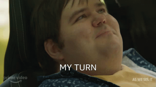 Black And White Person Holding Paper That Says It's My Turn To Torture You GIF
