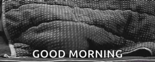 Black And White Person Laying On Bed Good Morning GIF