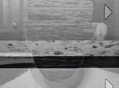 Black And White Person's Face On Screen GIF
