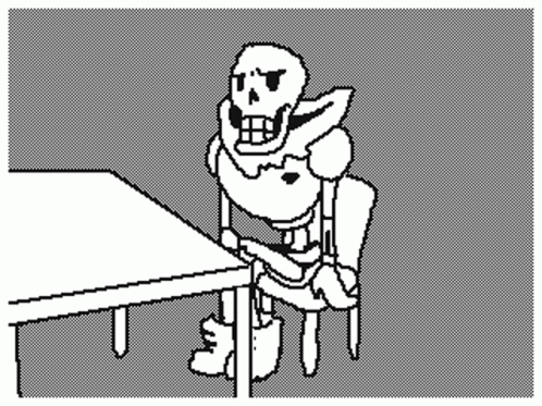 Black and White Person Sitting in Chair With Open Mouth