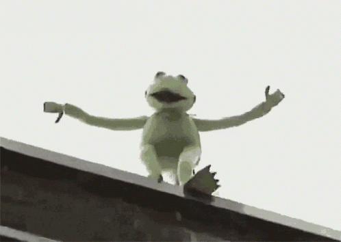 Black And White Person Standing Next To Table GIF