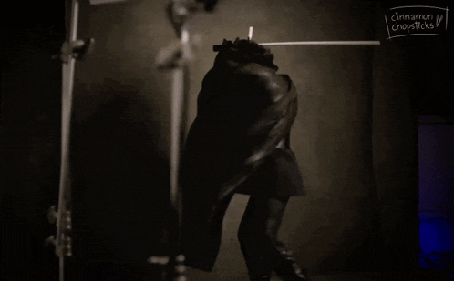 Black And White Person With Cinnamon And Chopsticks GIF