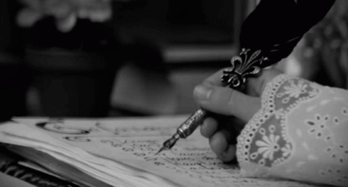 Black And White Person Writing With Pen GIF