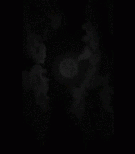 Black and White Photo of Full Moon in Cloudy Sky