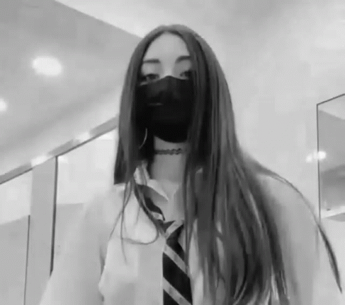 Black and White Photo of Girl Wearing Mask