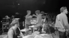 Black and White Photo of Group on Stage