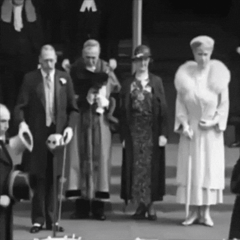Black and White Photo of Group Standing Together