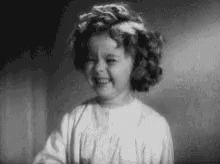 Black and White Photo of Little Girl Smiling