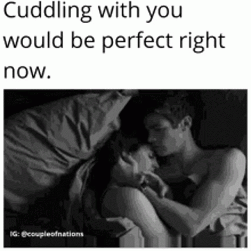 Black and White Photo of Man and Woman Hugging in Bed