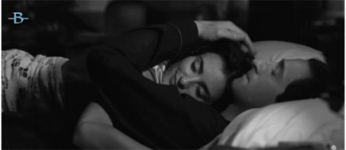 Black And White Photo Of Man And Woman Hugging With Letter B GIF