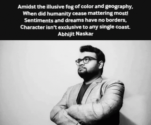 Black and White Photo of Man With Quote Behind Him