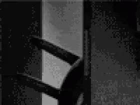Black and White Photo of Person by Window
