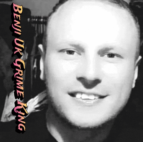 Black and White Photo of Smiling Man With Beni Uk Grime King