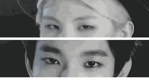 Black and White Photo of Two Men's Eyes