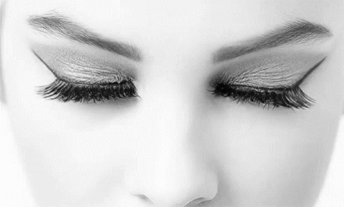 Black And White Photo Of Woman Eyes With Long Eyelashes GIF