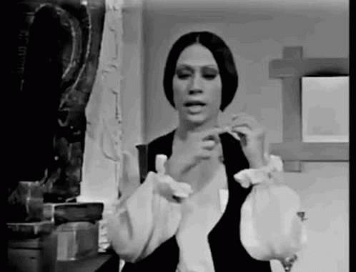 Black and White Photo of Woman in Room