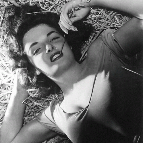 Black And White Photo Of Woman Laying Down GIF