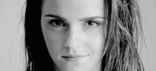 Black And White Photo Of Woman With Long Hair Smiling GIF