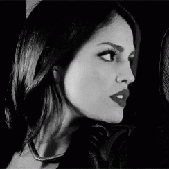 Black and White Photo of Woman With Red Lipstick and Choker