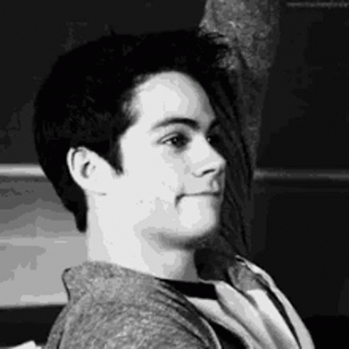 Black and White Photo of Young Man Making Silly Face