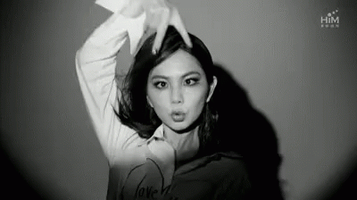 Black and White Photo Woman Making Funny Face Hands on Head