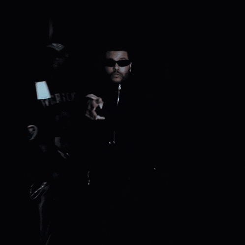 Black And White Police Officer Talking Next To Car GIF