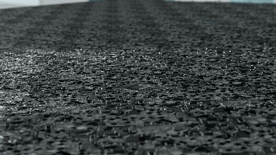 Black And White Rain On Brick Floor GIF