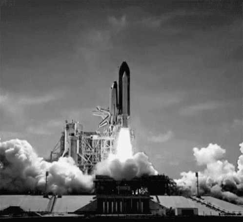 Black And White Rocket Launching Into Space GIF