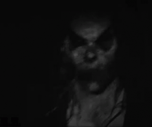 Black And White Scary Face In The Dark GIF