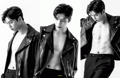 Black and White Shirtless Man in Leather Jacket Adam