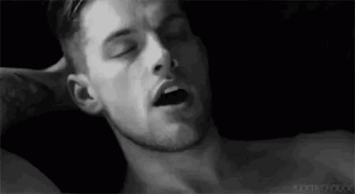 Black and White Shirtless Man Mouth Open Eyes Closed