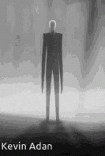 Black and White Slender Man Standing in Dark