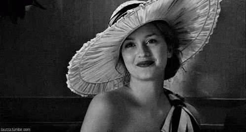 Black and White Smiling Woman in Large Hat